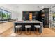 Elegant kitchen with a large marble island and modern appliances at 220 Glencoe St, Denver, CO 80220