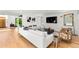 The bright living room features hardwood floors and contemporary design at 220 Glencoe St, Denver, CO 80220
