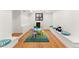 Fun playroom with bright colors, built-in seating, and a charming area at 220 Glencoe St, Denver, CO 80220