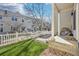 Townhome featuring artificial grass, a small porch and white picket fence at 1492 Red Cliff Way, Castle Rock, CO 80109