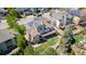 Aerial view of the backyard featuring a wooden deck and lush landscaping that surrounds a beautiful home at 58 Rogers Ct, Golden, CO 80401