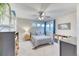 Bright bedroom features carpet, modern ceiling fan, and decor is ideal for children or guests at 58 Rogers Ct, Golden, CO 80401
