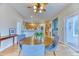 Inviting dining area with hardwood floors, easy access to the kitchen, and lots of natural light at 58 Rogers Ct, Golden, CO 80401