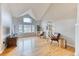 Elegant living room with hardwood floors, ample natural light, and stylish furnishings creating a sophisticated ambiance at 58 Rogers Ct, Golden, CO 80401