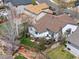 Aerial view of a home showcasing its backyard, deck, and proximity to neighboring houses at 5133 S Liverpool Way, Centennial, CO 80015
