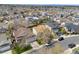 Aerial view of a residential neighborhood with tree-lined streets and well-maintained homes at 5133 S Liverpool Way, Centennial, CO 80015
