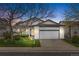 Charming single-Gathering home featuring an attached two-car garage, landscaped front yard and a cozy covered porch at 5133 S Liverpool Way, Centennial, CO 80015