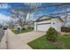 Beautiful home with manicured lawn, garden, and a 'Coming Soon' sign at 5133 S Liverpool Way, Centennial, CO 80015