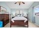 Spacious main bedroom with plush carpet, natural light, and ample space at 5133 S Liverpool Way, Centennial, CO 80015