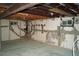 Spacious unfinished basement with natural light, ideal for storage or future renovation at 6775 S Sherman St, Centennial, CO 80122