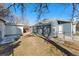 Exterior view of the fenced yard and detached shed in a private backyard at 3300 W 2Nd Ave, Denver, CO 80219