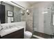 This stylish bathroom features a walk-in shower at 100 Detroit St # 103, Denver, CO 80206