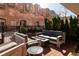 Beautiful outdoor patio with a modern fire pit and comfortable seating for relaxation and social gatherings at 100 Detroit St # 103, Denver, CO 80206