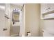 Compact bathroom with sleek fixtures, modern vanity, and neutral color scheme at 5150 W Colgate Pl, Denver, CO 80236