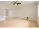 Bright and open living room with hardwood floors and ample natural light at 5150 W Colgate Pl, Denver, CO 80236