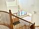Spacious foyer and staircase with elegant chandelier at 6459 S Queen Way, Littleton, CO 80127