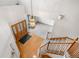 Welcoming foyer and staircase with a large chandelier at 6459 S Queen Way, Littleton, CO 80127