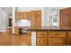 Kitchen island with granite countertops and plenty of storage space at 6459 S Queen Way, Littleton, CO 80127