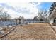 Grassy backyard with stone landscaping at 8094 E Kenyon Pl, Denver, CO 80237