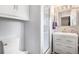 Modern bathroom featuring a sleek vanity, glass-enclosed shower, and contemporary finishes at 8094 E Kenyon Pl, Denver, CO 80237