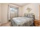 Cozy bedroom with a comfortable bed and decorative accents; inviting and serene at 8094 E Kenyon Pl, Denver, CO 80237