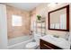 Stylish bathroom with tiled shower, modern vanity, and ample counter space at 4344 Wyandot St, Denver, CO 80211