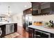 Modern kitchen with stainless steel appliances and a sleek design at 4344 Wyandot St, Denver, CO 80211