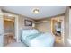 Bedroom featuring hardwood floors and doorways leading to other rooms in the house at 3282 W 66Th Ave, Denver, CO 80221