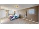 Bright bedroom with a comfortable bed, stylish decor, and ample natural light from the large window at 3282 W 66Th Ave, Denver, CO 80221