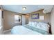 Bedroom featuring hardwood floors and ample natural light from the window at 3282 W 66Th Ave, Denver, CO 80221