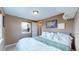 Spacious bedroom with a king-size bed and plenty of natural light at 3282 W 66Th Ave, Denver, CO 80221