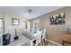 Inviting dining room featuring modern lighting, neutral tones, and stylish decor for everyday meals at 3282 W 66Th Ave, Denver, CO 80221