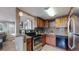 Modern kitchen featuring stainless steel appliances and tile backsplash at 3282 W 66Th Ave, Denver, CO 80221