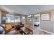 Living room with leather furniture, open floor plan, view of bedroom at 3282 W 66Th Ave, Denver, CO 80221