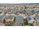 The aerial view captures a residential neighborhood with neatly arranged homes and driveways at 3502 First Light Dr, Castle Rock, CO 80109