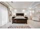 Spacious primary bedroom with tray ceiling, carpet, and ample space for relaxation and rest at 3502 First Light Dr, Castle Rock, CO 80109