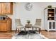 Cozy sitting area featuring comfortable upholstered chairs and a decorative rug, perfect for intimate conversations at 3502 First Light Dr, Castle Rock, CO 80109