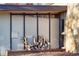 Modern exterior with wood accents and stone detailing that enhance the home's natural and artistic appeal at 3650 Chimayo Rd, Littleton, CO 80123