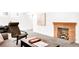 Finished basement featuring carpet flooring and a brick fireplace at 1185 Glencoe St, Denver, CO 80220