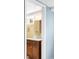 Bathroom vanity featuring wooden cabinetry and a sink at 1185 Glencoe St, Denver, CO 80220