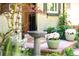 Charming front porch with a bird bath and flowers at 1185 Glencoe St, Denver, CO 80220