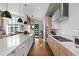 Sleek kitchen with an oversized island, stainless steel appliances, and an open layout at 10205 Inspiration Dr, Parker, CO 80138
