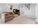 Cozy living room with plush seating, deer head wall decor and warm ambiance offers a comfortable retreat at 10205 Inspiration Dr, Parker, CO 80138