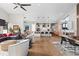 Spacious open-concept living area, connects kitchen, living, and dining spaces at 10205 Inspiration Dr, Parker, CO 80138