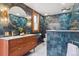 Bathroom with double vanity, unique blue tile and modern fixtures at 1022 N Pearl St # 101, Denver, CO 80203