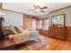 Bedroom with hardwood floors, wainscoting, built-in storage, and a window seat at 1022 N Pearl St # 101, Denver, CO 80203