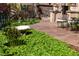 Beautiful garden area with stone accents and manicured landscaping, perfect for outdoor relaxation and enjoying nature at 1022 N Pearl St # 101, Denver, CO 80203