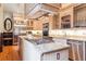 A modern kitchen boasts stone countertops, stainless steel appliances, and a large island for prepping food at 1022 N Pearl St # 101, Denver, CO 80203
