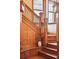 Beautiful staircase with wood details, stained-glass windows, and elegant vase at 1022 N Pearl St # 101, Denver, CO 80203