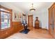 Workout room featuring wood trim, a decorative light fixture, and hard wood floors at 1022 N Pearl St # 101, Denver, CO 80203